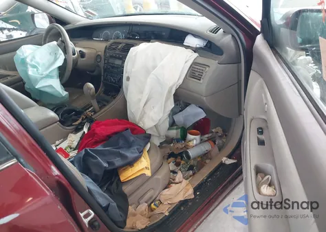 2000 Toyota Avalon Xl z USA, uszkodzony, nr VIN 4T1BF28B0YU037820